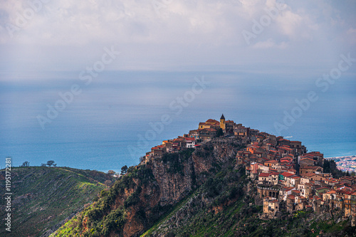 top view of the village of Grisolia with a cloudy sky in the background, Cosenza