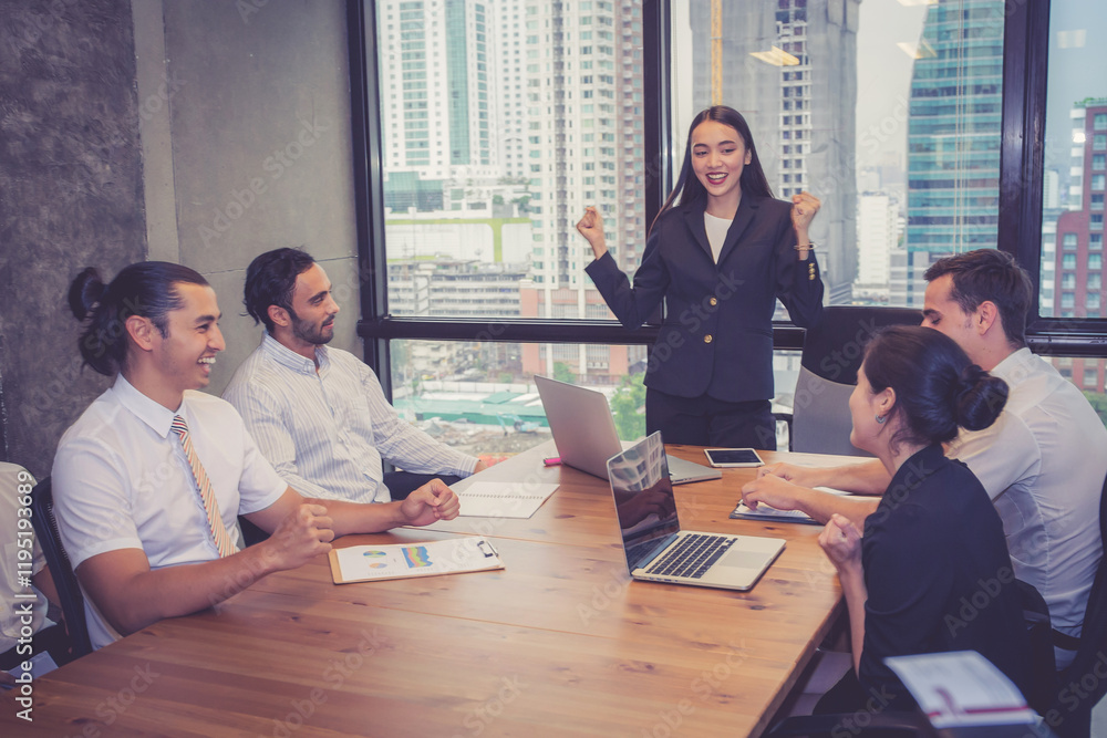 Fototapeta premium Group business people team meeting together while woman presenting and explaining about planning and strategy marketing in modern office, brainstorming and collaboration of teamwork, business concept.