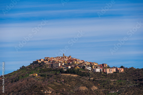 top view of the village of Grisolia with a cloudy sky in the background, Cosenza