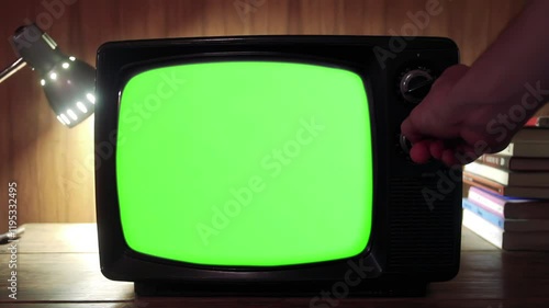 Hand Switching On Green-Screen Television - Close Up - Zoom In - 100% Real Video, Not AI Generated - 4K