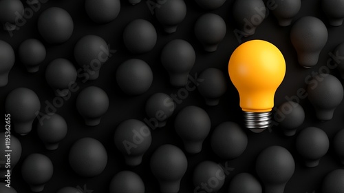 The Bright Idea: One shining yellow lightbulb stands out amongst a sea of dark lightbulbs, symbolizing innovation, creativity, and unique thinking. photo