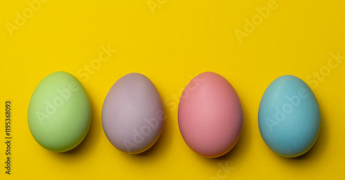 Easter eggs on a yellow background