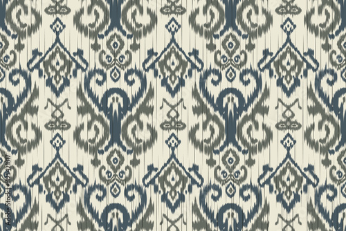 Seamless ethnic ikat pattern featuring tribal and folk embroidery combined with Mexican Aztec geometrics. Perfect for graphic art, rug design, wallpaper, wrapping and clothing.