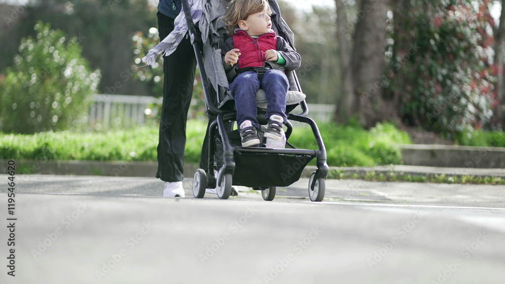 Parent crossing street with baby stroller Parent crossing street with baby stroller