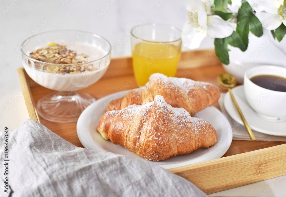 Breakfast with croissants on the table. Breakfast with croissants on the table.