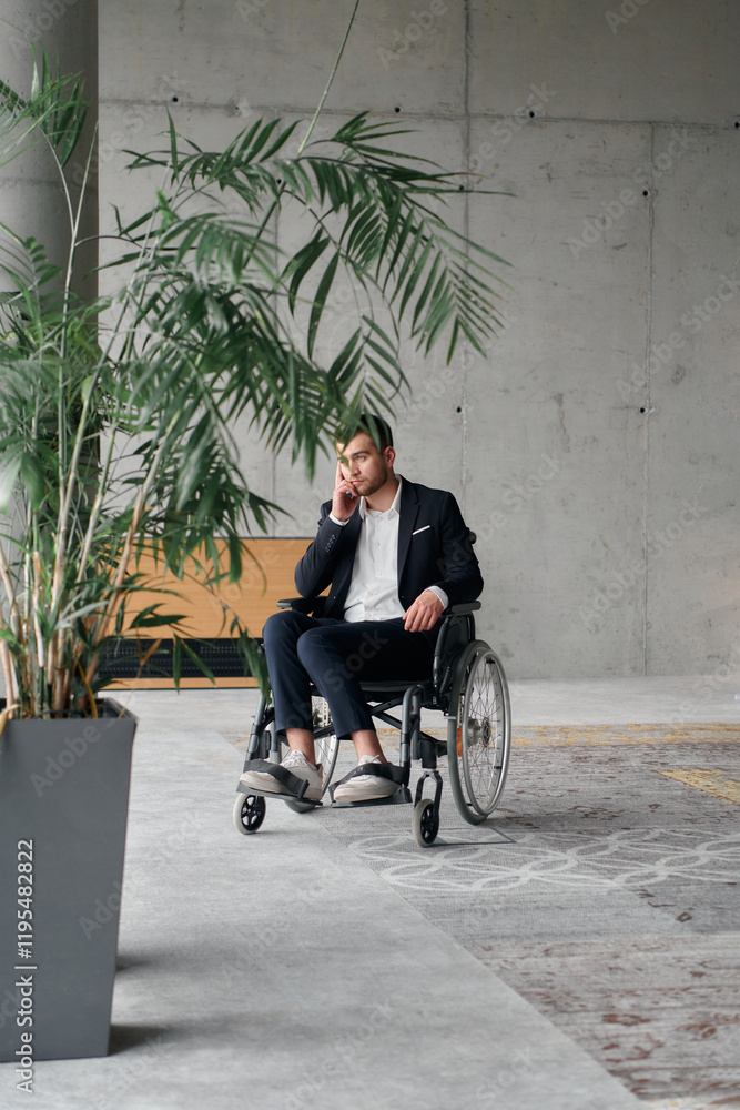 A director in a wheelchair sitting alone in an empty office, deeply reflecting on business strategies and decisions, contemplating the path forward with focused determination. A director in a wheelchair sitting alone in an empty office, deeply reflecting on business strategies and decisions, contemplating the path forward with focused determination.