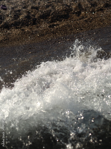 Wallpaper Mural The sea wave runs into the pebble beach. Storm at sea Torontodigital.ca