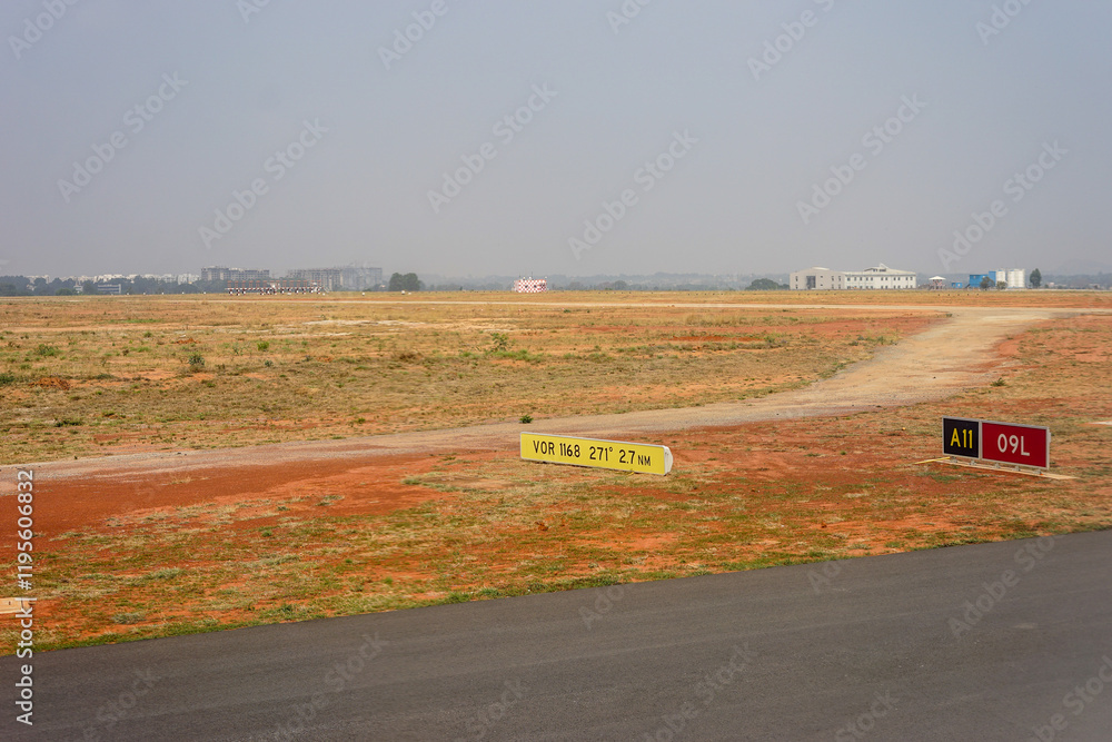 Bangalore Airport, Karnataka, India, a sign on a dirt road