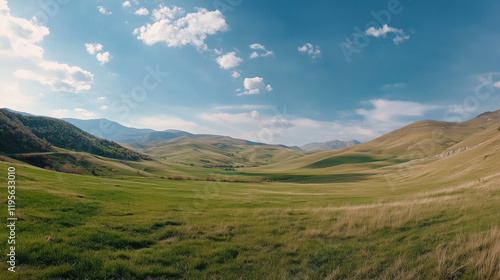 Panoramic Countryside with Rolling Green Hills and Bright Sunny Fields in a Tranquil Rural Landscape






