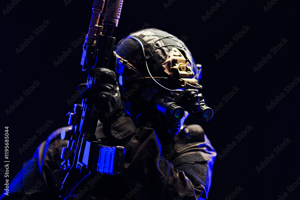 Naklejka premium Tactical Soldier Equipped with Night Vision Gear Holding Weapon in Dark