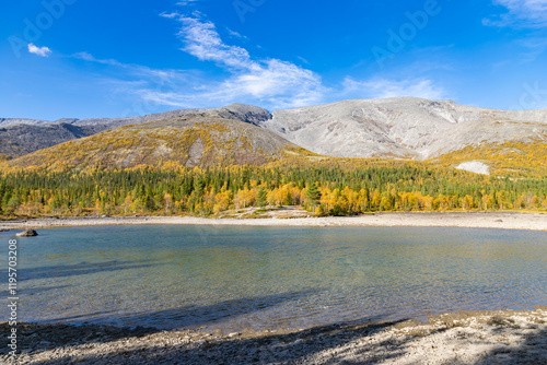 Obraz na płótnie Scenic view of Khibiny mountains with North Chorrgor pass with small lake on foreground. Kola Peninsula, Murmansk region, Russia. w salonie
