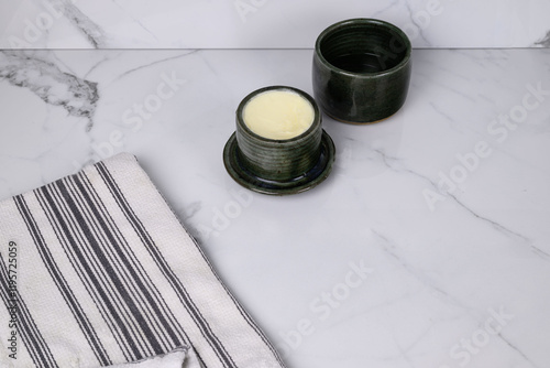 Tableau sur toile French butter crock on a white countertop