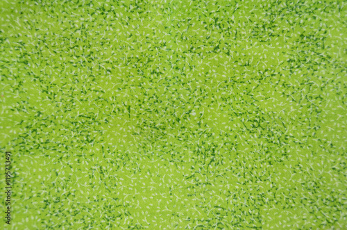 Abstract textured background in greens and whites