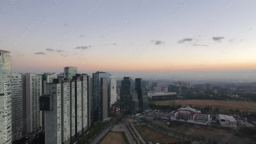 Aerial view of the urban high-rise buildings overlooking the Parque La Mexicana at sunset, Mexico Aerial view of the urban high-rise buildings overlooking the Parque La Mexicana at sunset, Mexico