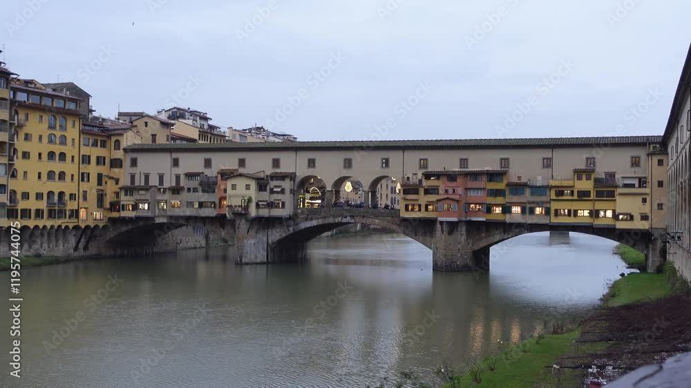 Medieval Ponte Vecchio bridge over the Arno River at sunset in Florence, Tuscany, Italy Medieval Ponte Vecchio bridge over the Arno River at sunset in Florence, Tuscany, Italy