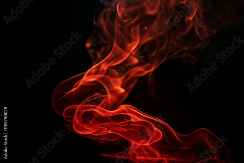 Red smoke elegantly twists and flows, forming captivating shapes in darkness photo