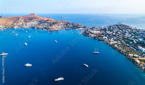 Fototapeta Naklejka Na Ścianę i Meble -  Yalikavak Bay of Bodrum. Mugla, Turkey. Panoramic view of Yalikavak marina and beach. Drone shot.