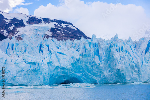 Wallpaper Mural Perito Moreno glacier in Patagonia, Argentina. Blue ice glacier with huge seracs falling into the waters of a glacier lake. Ice shining on the sun with deep blue color in the cold Antarctic region of  Torontodigital.ca