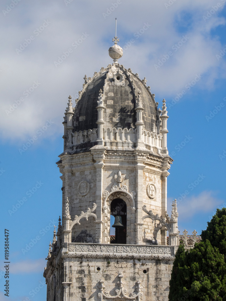 Portugal, Lisbon. The dome of the Jeronimos Monastery (Mosteiro dos Jeronimos) from the Praca do Imperio, Belem District. Portugal, Lisbon. The dome of the Jeronimos Monastery (Mosteiro dos Jeronimos) from the Praca do Imperio, Belem District.