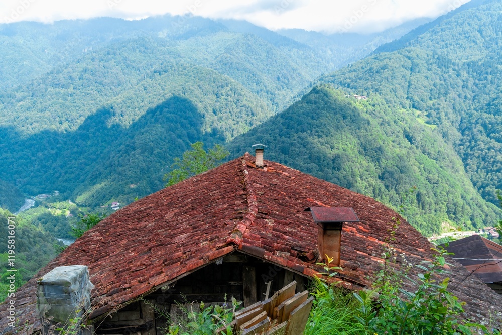 rustic red-tiled roof amidst the lush green valleys of Turkey, highlighting the scenic beauty and rural charm of the region. rustic red-tiled roof amidst the lush green valleys of Turkey, highlighting the scenic beauty and rural charm of the region.
