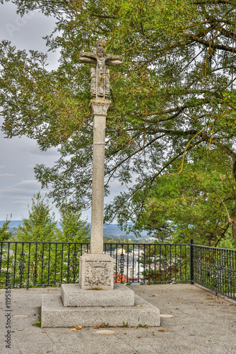 Spain, Galicia, Sarria. One of the many crosses in Galicia with Jesus on one ...