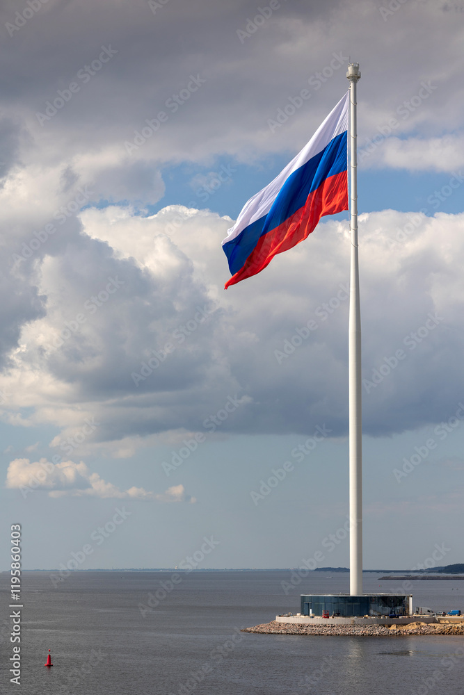 Fototapeta premium Flag of Russian Federation is flying in air on blue sky and white cumulus clouds. National flag of Russian. vertical photo.