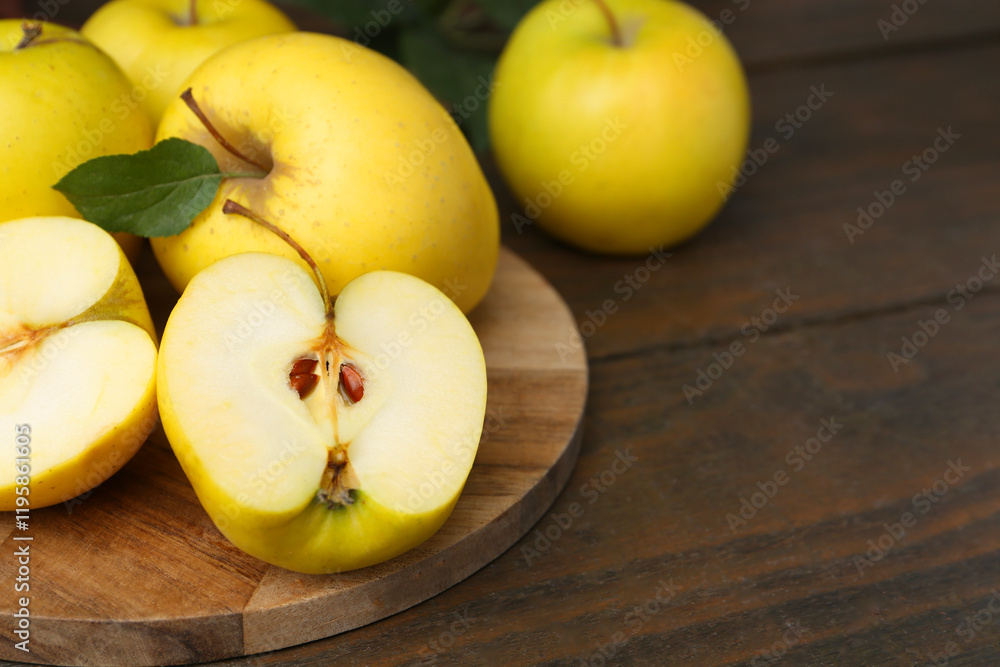 Fresh ripe yellow apples on wooden table, closeup. Space for text Fresh ripe yellow apples on wooden table, closeup. Space for text