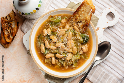 Slika na platnu White Bean Cannellini Escarole Soup with cheese and toast bread