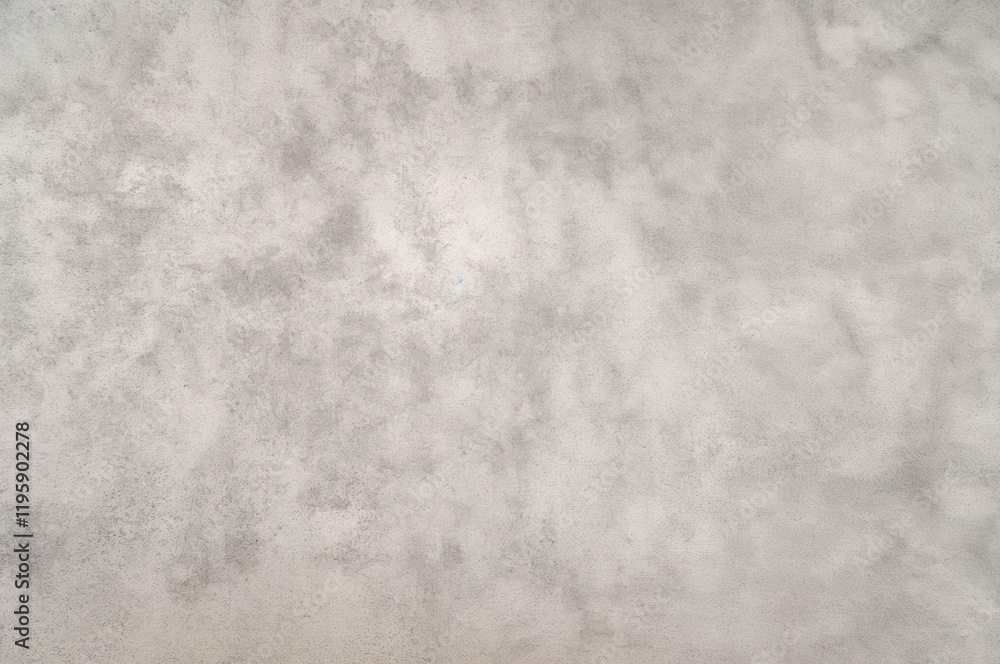 a gray concrete wall texture with minor imperfections. a gray concrete wall texture with minor imperfections.