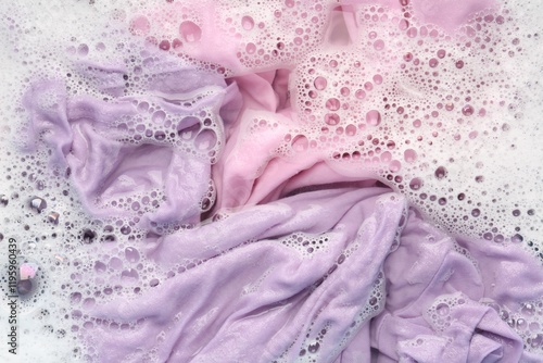 Wallpaper Mural Colorful clothes soaked in water before washing, top view Torontodigital.ca