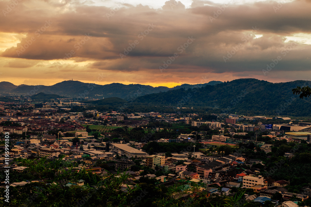 Background of evening sky light with the sun setting behind the horizon in the mountains. There is a beautiful golden light. Background of evening sky light with the sun setting behind the horizon in the mountains. There is a beautiful golden light.