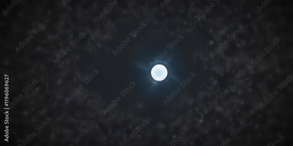 Small blue circle with white dot in center on a dark background resembling internet connection, internet symbol,  web,  WiFi