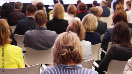 Wallpaper Mural Conference with female audience, the symposium meeting, participants attendees in room hall listen to lecturer, group of women on a congress together listen to speaker on stage at master-class event Torontodigital.ca