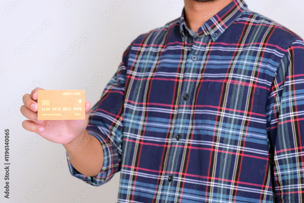 Person hand holding and showing credit card Person hand holding and showing credit card