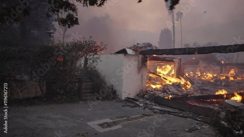Homes burning down in the Palisades fire 