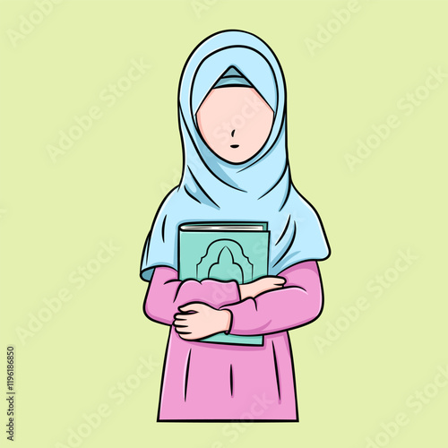 Muslim girl in hijab holding the Koran
