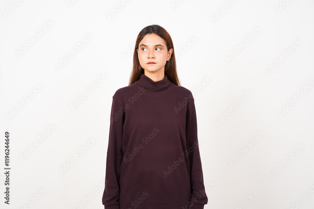 Fototapeta premium Looking aside with serious face Of Beautiful Asian Woman Isolated On White Background