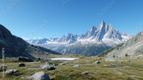Scenic mountain landscape with clear blue skies and lush greenery.