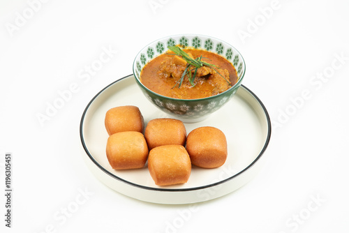 Indulge in the savory flavors of curry puffs and the soft texture of mantou, a classic dim sum pairing isolated on white background