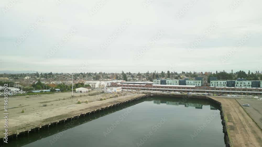 An ascending drone shot of Mariner Square in Alameda California.