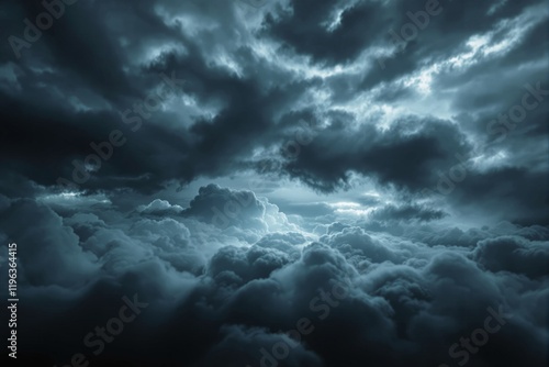 Dramatic cloudy sky with dark and illuminated clouds in atmospheric lighting. photo