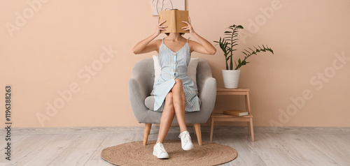 Pretty young woman covering...
