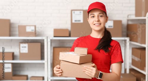 Female worker with parcel b...