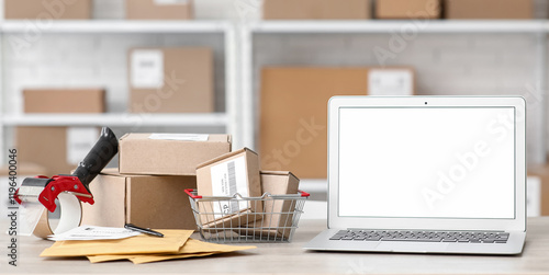 Blank laptop with parcel bo...