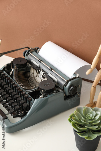 Vintage typewriter with woo...