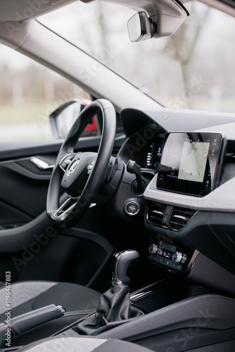Modern car interior with touchscreen and gear stick