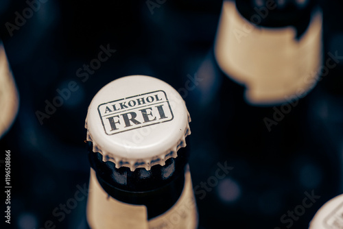 Bottlecap of beer bottle with label that spells 