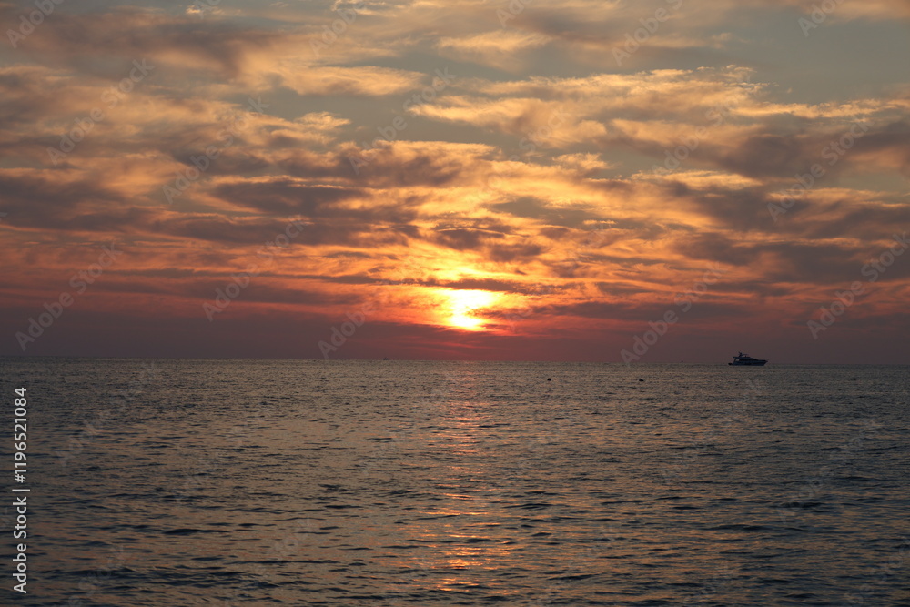 Fototapeta premium Sunset ocean sky Dusky swirling sky. High quality photo