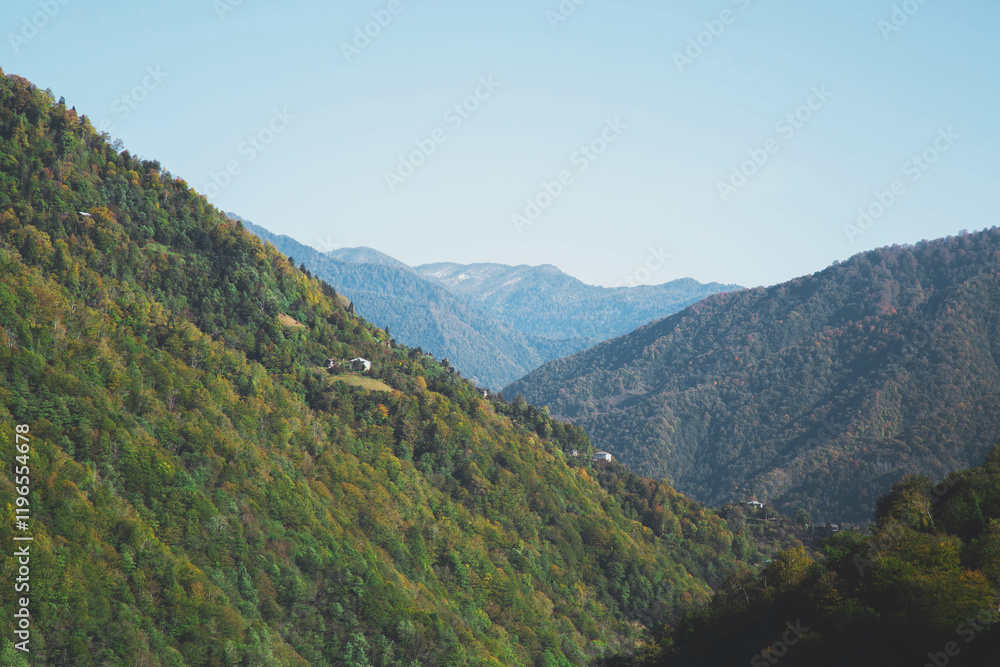 Vibrant green mountains in the scenic region of Adjara, Georgia, with layers of peaks fading into the distance under a bright, clear sky, concept of travel, trekking Vibrant green mountains in the scenic region of Adjara, Georgia, with layers of peaks fading into the distance under a bright, clear sky, concept of travel, trekking