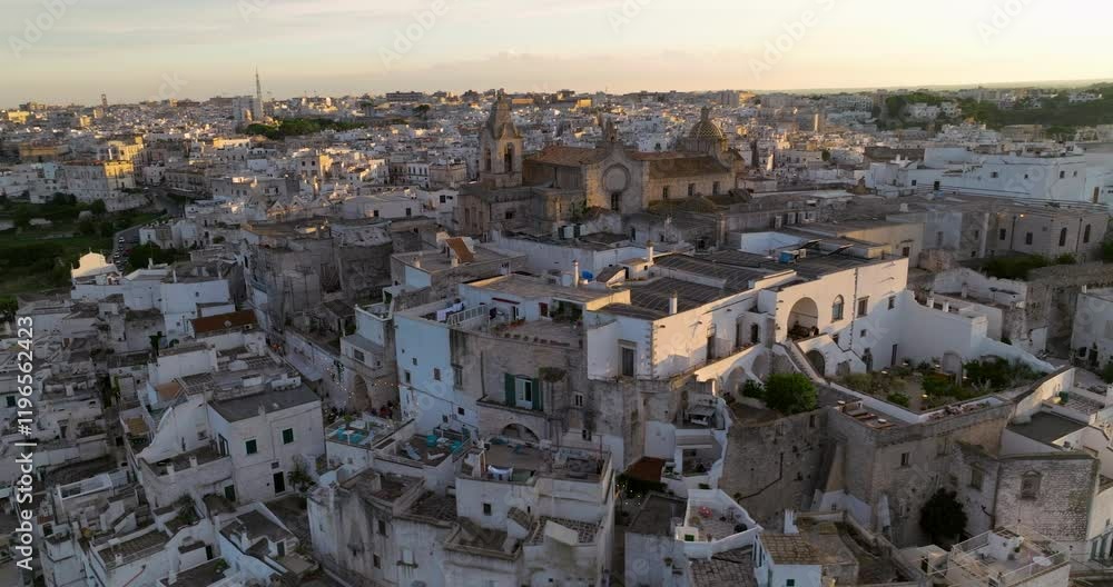 Famous White City Of Ostuni At Sunset In Puglia, Italy. Aerial Drone Shot Famous White City Of Ostuni At Sunset In Puglia, Italy. Aerial Drone Shot